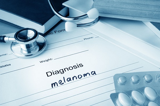 40327847 - diagnostic form with diagnosis melanoma and pills.
